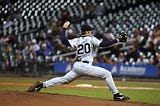 Baseball pitcher pitching.