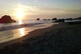 Color photo of Harris Beach, Oregon at sunset taken by author Stella Martann
