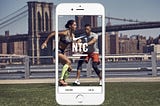 Smartphone with NTC app and the Brooklyn Bridge in the background.