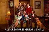 The cast of PBS Masterpiece series All Creatures Great & Small on the set of their TV living room.