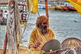 Pandit worshipping Holy River, Ganga.