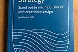 The book “The Umami Strategy: Stand out by mixing business with experience design” laying on a table