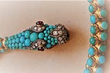 Turquoise and diamond necklace shaped like a serpent