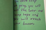 card that reads “You should keep on going, you will win the war and keep home and you will reach your dreams”