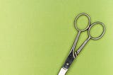 A picture of a pair of scissors as a metaphore for clipping