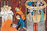 Medieval image of witches being executed