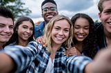 A group of Gen Z taking a selfie.