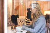 Woman typing on laptop