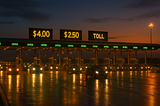 Estimate the number of Cars that pass through the Toll Plaza daily. | Guesstimation