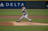New York Yankees pitcher Masahiro Tanaka pitches in a game at Yankee Stadium