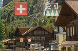 picture of Swiss village complete with the Swiss flag