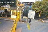Video still of gunman at gate during the October 7 attack