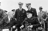 U.S. President Franklin D. Roosevelt (L) and UK Prime Minister Winston Churchill seated on the quarterdeck of HMS Prince of Wales off the coast of Newfoundland, Canada, August 10, 1941. Photo by IMAGO/piemags via Reuters Connect