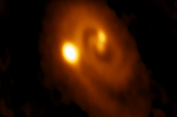 An ALMA millimeter wave telescope image of the formation of three protostars over a field of about 100 times the Earth-Sun distance.