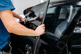 When to Roll Down Windows After Tinting?