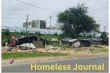 Homeless Journal header: Shanty town with Downtown in the background