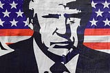 Cartoon image of Donald Trump in front of the American flag, with the caption “American Psycho”.
