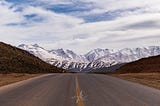 A stunning view of the mountain ranges from the middle of a highway in Zagros Mountain.