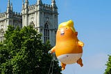 Donald Trump is depicted as a baby in diapers, in a parade balloon in London. Photo by Dave Lowe on Unsplash