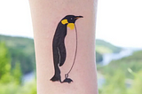 Penguin tattoos represent courage, bravery and deception