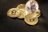 Glass globe and Bitcoin Cryptocurrency
