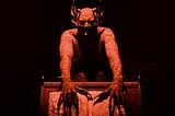 Satan standing at an alter from the film Haxen