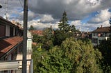 image out a balcony onto the backyards of swiss homes in basel