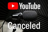 Closeup image of Shure microphone in a sound booth with words YouTube Canceled