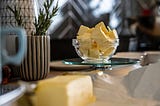 butter in glass dish with nice dining background