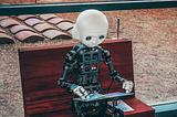 A robot staring at book.