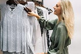 Happy woman shopping for clothes