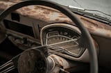 Rusty dashboard of an old car
