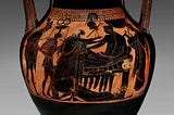 Attic black‑figure amphora showing the ransom of Hector: white‑haired Priam strides toward the reclining warrior Achilles, arms outstretched in supplication, while Achilles lounges on a couch holding a shallow drinking bowl above Hector’s naked, blood‑streaked corpse on the ground; at the left the god Hermes and a young attendant carry a tripod and bowls as ransom, and at the right a female servant approaches with a water jar, all set against the glossy black body of the vase.