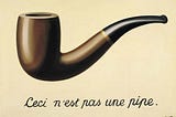 A painting of a pipe, with cursive French writing saying “This is not a pipe”.