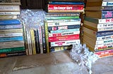 This shows books with mice nests on them.
