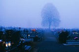 A large graveyard at night