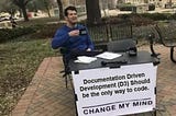 (meme) Confident man challenging people to convince him about documentation driven development