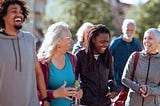 A group of funny and smiling people at the park