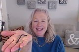 Betsy holding an Allen key in the palm of her hand