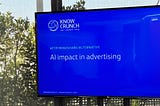 A blue screen with a slide of Knowcrunch that welcomes ATTP, Mindshare, and Alternative to the corporate training focused on AI impact in advertising.