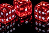 dice on a black, glass table in the context of the history of craps