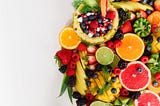 A healthy fruit platter with white background