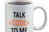 Coffee cup with message Talk Code to Me