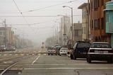 A foggy San Francisco day, looking west on Taraval st. down towards the ocean.
