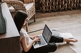 woman with laptop working