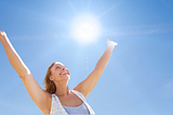 Woman basking in sunlight
