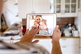 father facetiming with his family