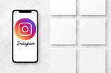 A phone with Instagram on the screen next to blank white blocks