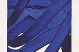 Deep blue paint strokes overlapping one another
