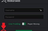 An image showing the settings cog on the thinkorswim login screen